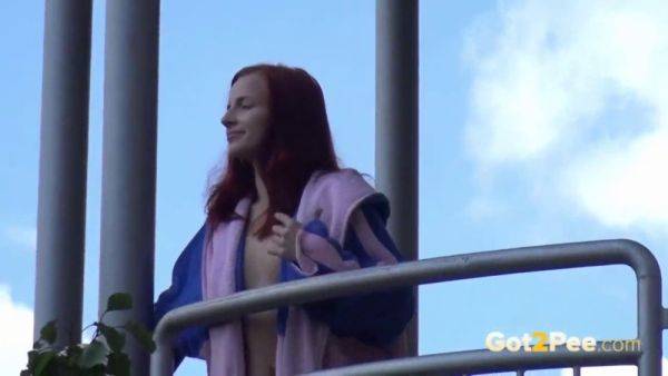 Watch this kinky redhead get a public surprise while peeing in the city - sexu.com on pornsfind.com