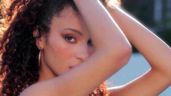 Enjoy watching this full clip titled : Curly hair latina posing in lingerie