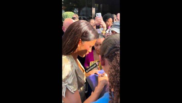 View the full scene titled : Zendaya nipple slip at a fan signing