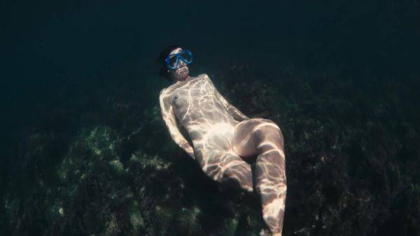 Enjoy watching uncensored movie : A Naked Buttty Girl Swims In The Ocean But Someone Is Watching Her