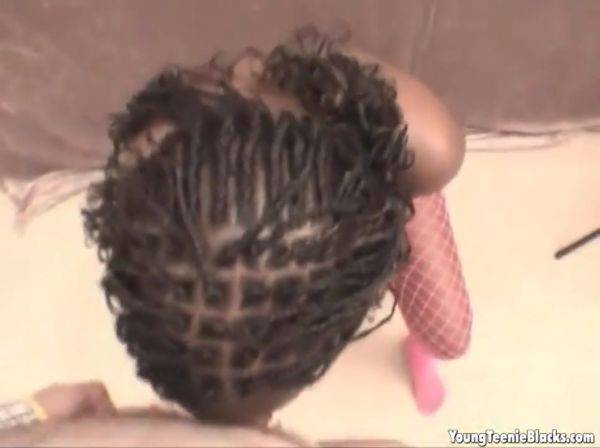 Stream the full video : Stockinged busty ebony teen goes down on dick