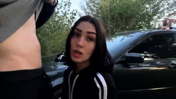 Watch the uncut scene called : Brunette gives mass blowjob outdoors