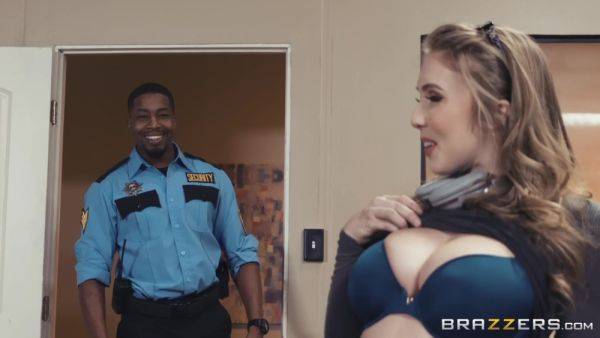 Watch the uncut movie titled : Black security guard fucks sexy redhead chick in the library