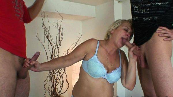 View the uncut scene of : Blonde mature doggystyled in threesome