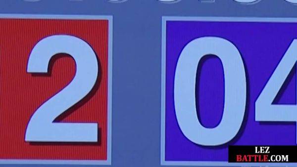 Watch the complete video named : Wrestling Asian lez licks winner muscles after losing fight