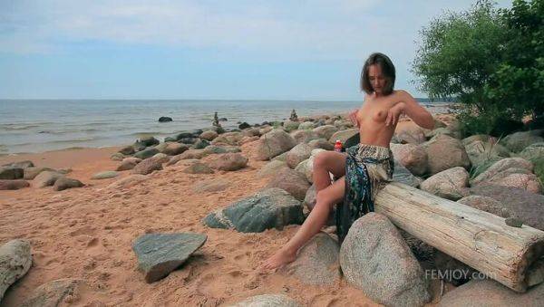 Watch this uncensored video : Solitary Brunette Owns Private Outdoor Shore