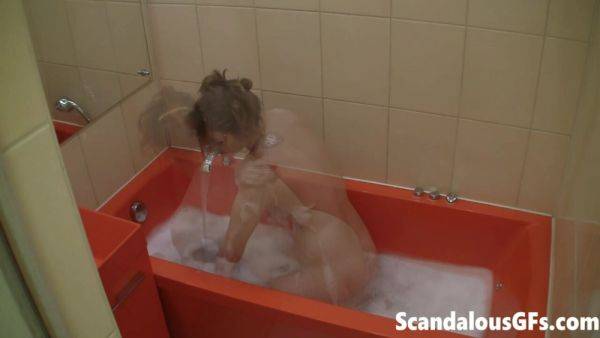 Watch this hardcore scene titled : Mandy showing natural tits rubbing in Bathtub