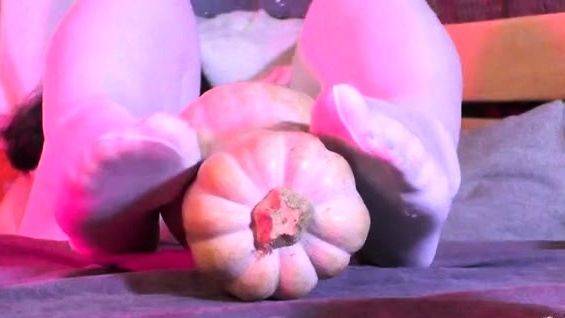 Enjoy watching this uncut scene named : mistresslegs - Nylon Feet Rubbing The Big Pumpkin