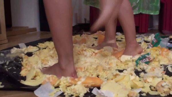 Watch the hardcore video named : Sluts trampling food in the living room by Foot Girls