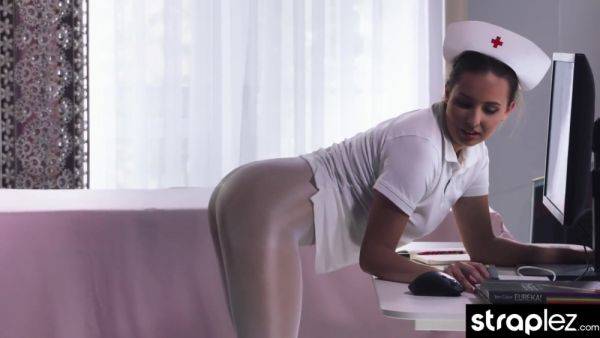 Play this full clip of : Sexy Fetish Nurse Fucks Her Colleague With A Squirting Dildo