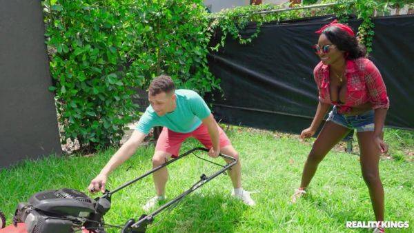 Play this uncensored scene of : Busty black babe gets laid with the young gardener
