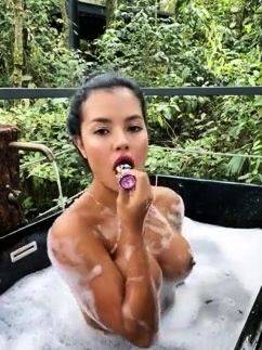 Enjoy watching the uncut video named : Busty babe playing with her big boobs