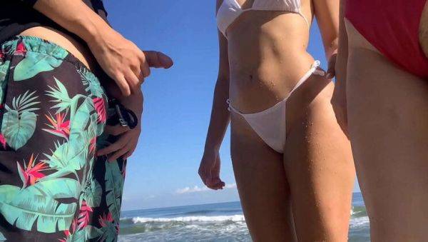 Play this uncut clip : Naked Beach Flash: Horny Girls Get a Dose of Big Dick