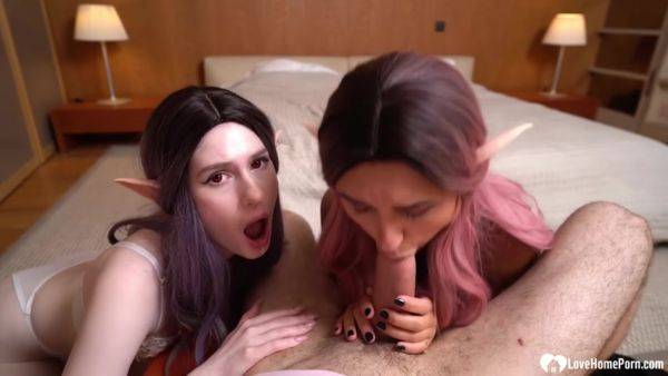 View HD clip called : Two Elves Suck A Big Hard Pole