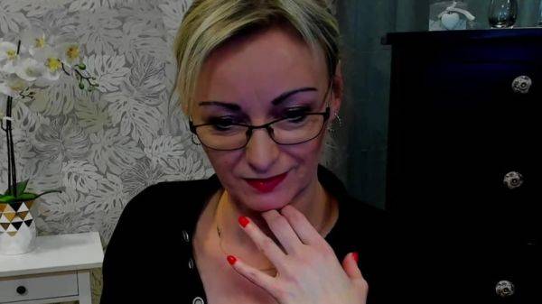 Stream this uncensored clip titled : German MILF posing in mini skirt on webcam