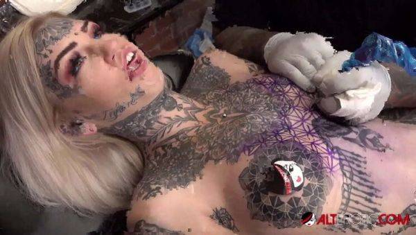 Enjoy watching this hardcore movie titled : Amber Luke Gets Tattooed While Sascha Plays with Her Big Tits
