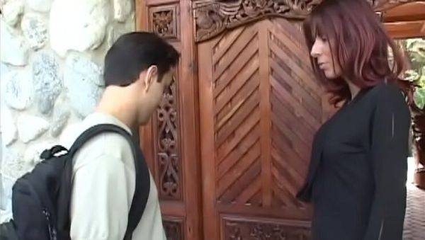 Enjoy watching the full clip of : Hot MILF with auburn hair fucks her son's best friend outdoors