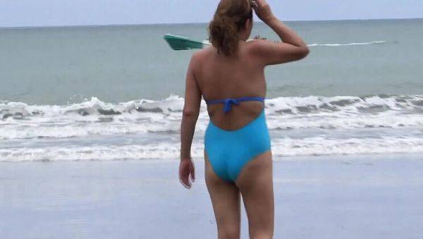 Play the HD clip called : Stepmom Flaunts Her Hairy Pussy on Beach and Makes My Hard Dick Cum