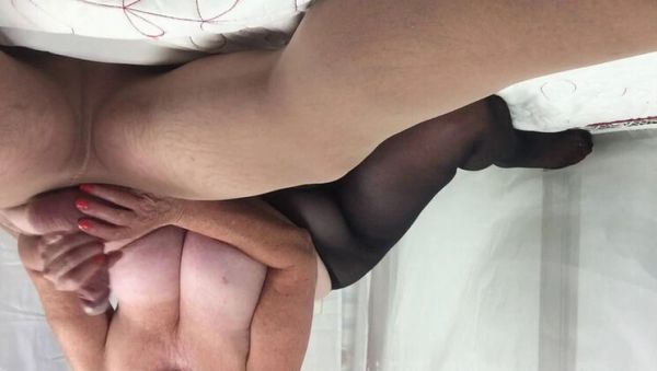 Watch the hardcore movie of : Mrs Mature Homemade Footjob Wanking Friend's Big Cock Pantyhose