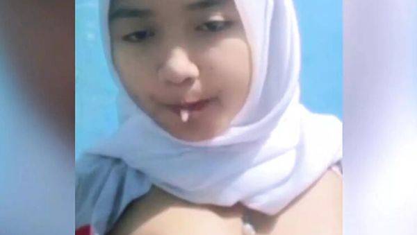 Play uncensored video of : Asian Teen Squeezes Her Big Natural Tits for Perfect Solo Orgasm