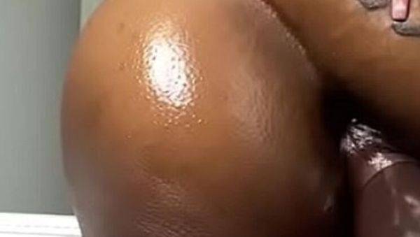 Watch the uncensored clip titled : Mini Stallion rides huge black dildo in hot solo ebony teen action