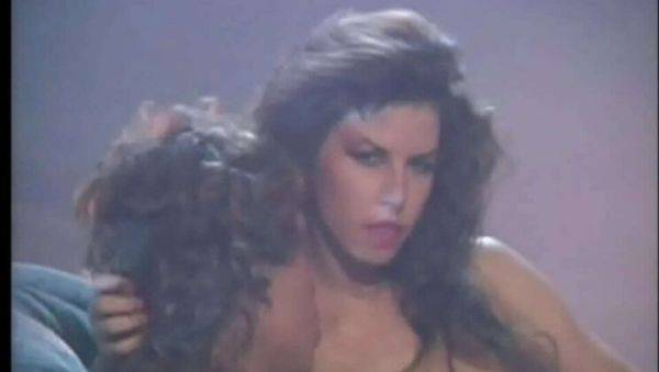 View this uncensored video titled : Busty Catwoman Selena Steele & Racquel Darrian in Classic 90s Porn with Rocco Siffredi