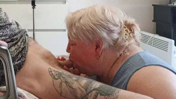 Watch this uncensored video titled : Hot MILF Neighbor Sucks Dick and Swallows Cum While Wife Watches - Zona901