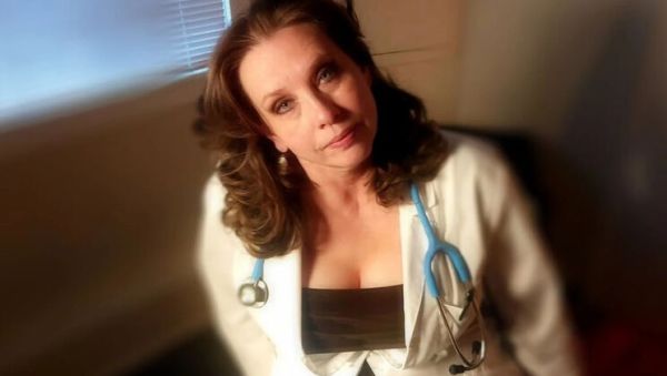 Watch the HD clip named : Sexy Mature MILF Doctor Full Scene: Examining a Young Man's Curved Cock