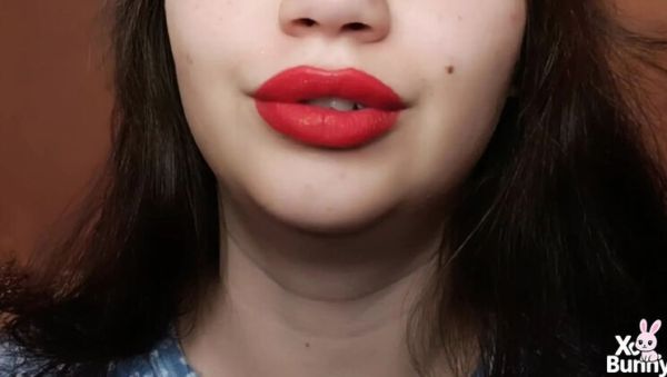 View the uncut clip named : XO Bunny Big Red Lips Smoking Close Up POV