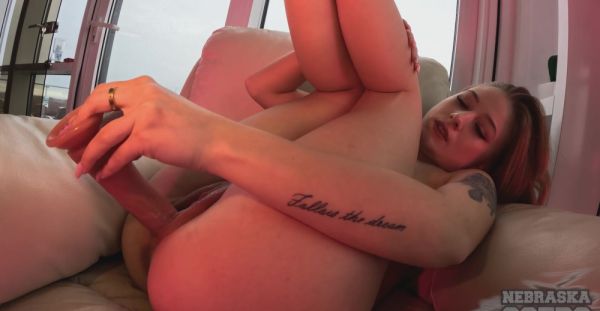 View uncensored clip titled : Amateur Elizabeth plays with her pussy on the sofa with a dildo