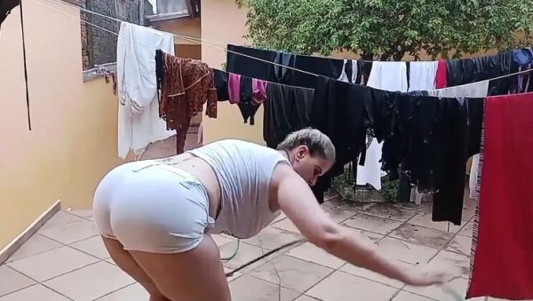 Watch this uncensored clip called : Tiffany Montavani MILF Fingering Her Pussy With a Hose in the Yard
