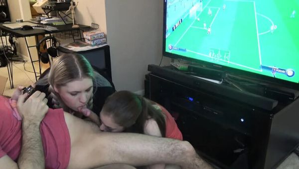 Enjoy watching the uncut clip of : Double Blowjob While He Plays FIFA