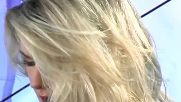 Watch uncensored scene named : Blonde babe in black stockings teases and fingers herself outside