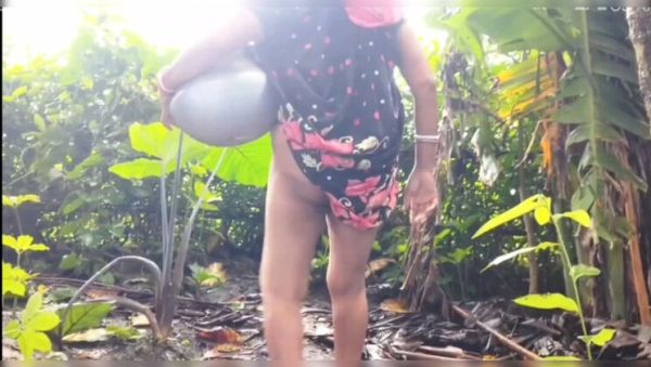 Stream uncut clip of : Amazing Pee in Pot Outdoor with Nomita Boudi - Desi Village Sex